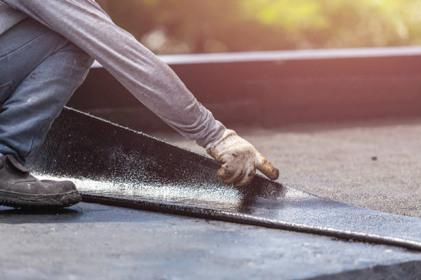Professional Basement Waterproofing technician working in Rickman, TN